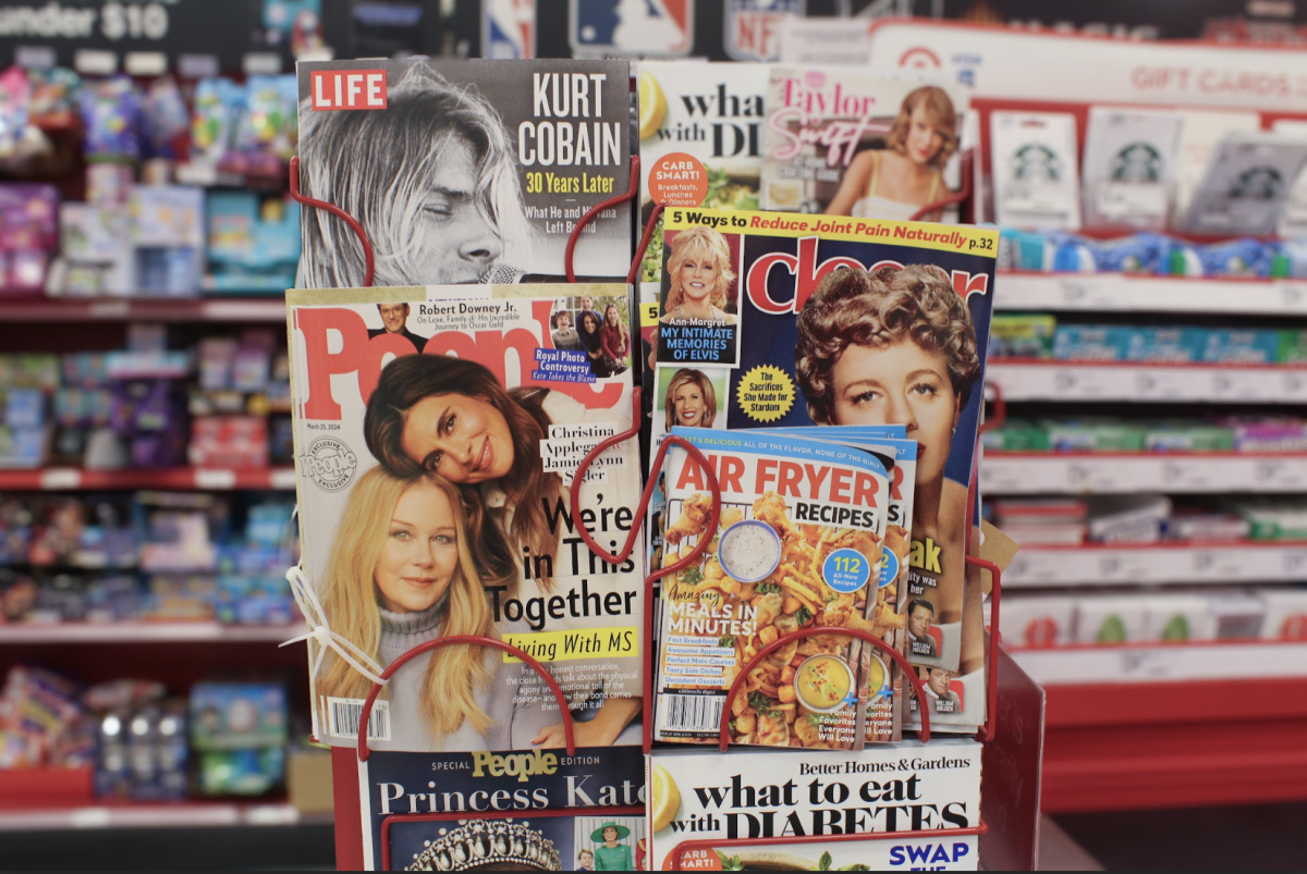 Celebrity culture is displayed at Target on magazines for the entertainment of the public.